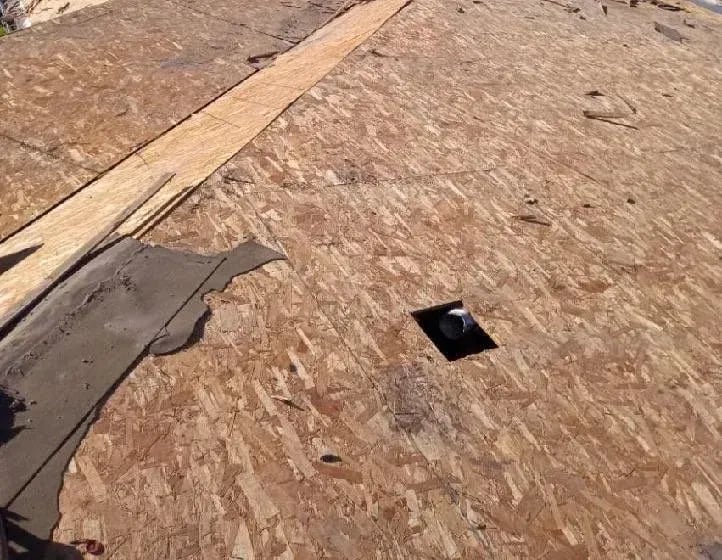 Roof deck exposed after an old tile roof was torn off