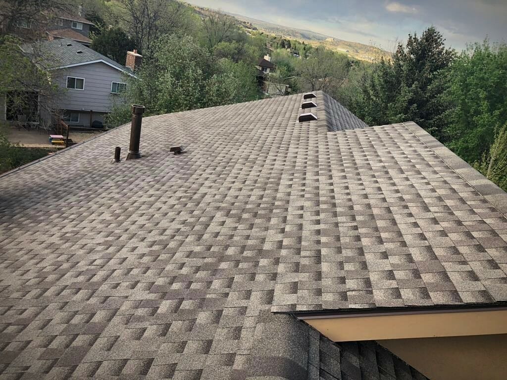 What to Expect When Replacing Wood Shingles with Asphalt Shingles